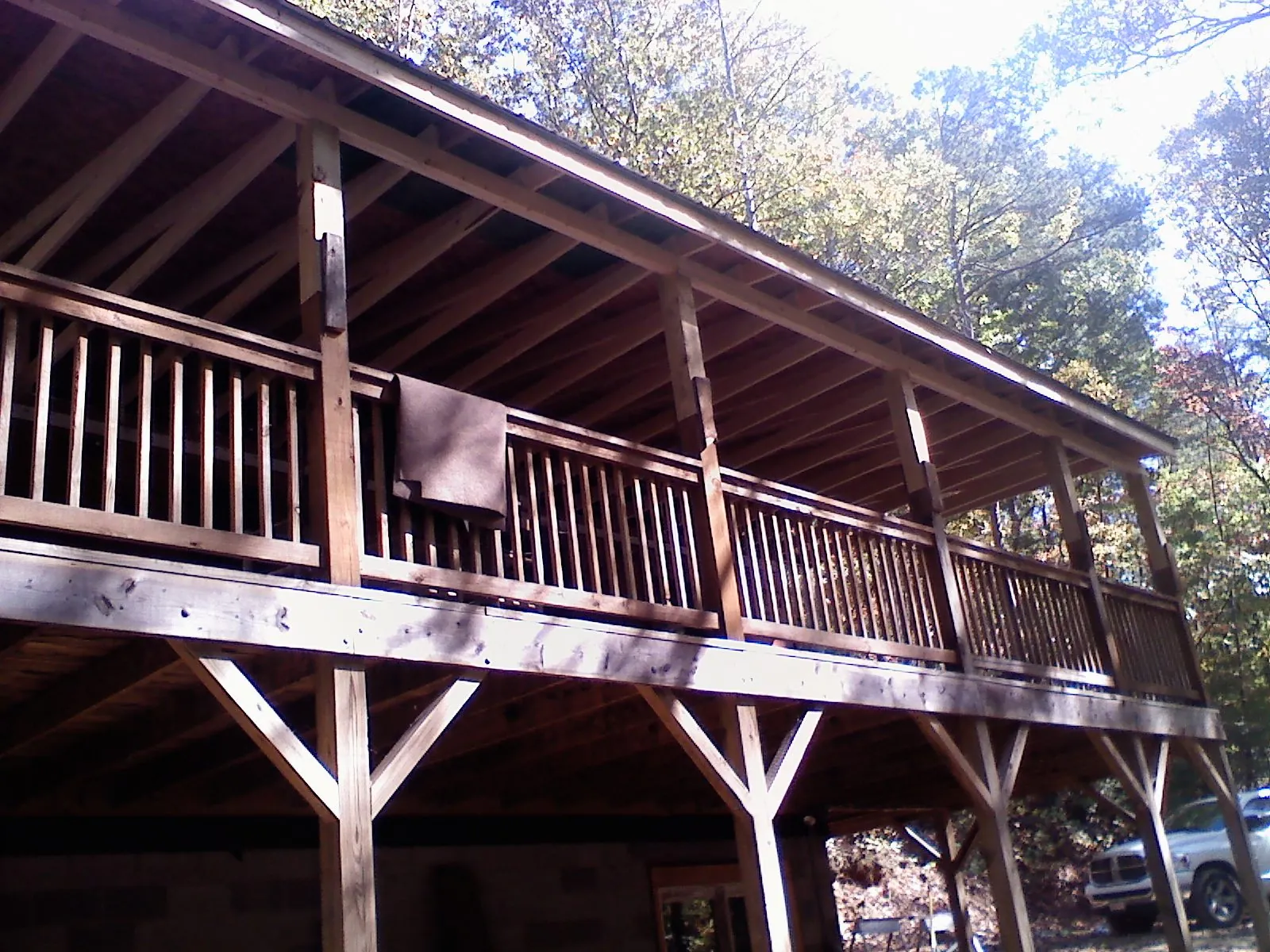 Timber framing under a new elevated porch and deck — Roof Leak Repair in Centertown by Roofing Brothers